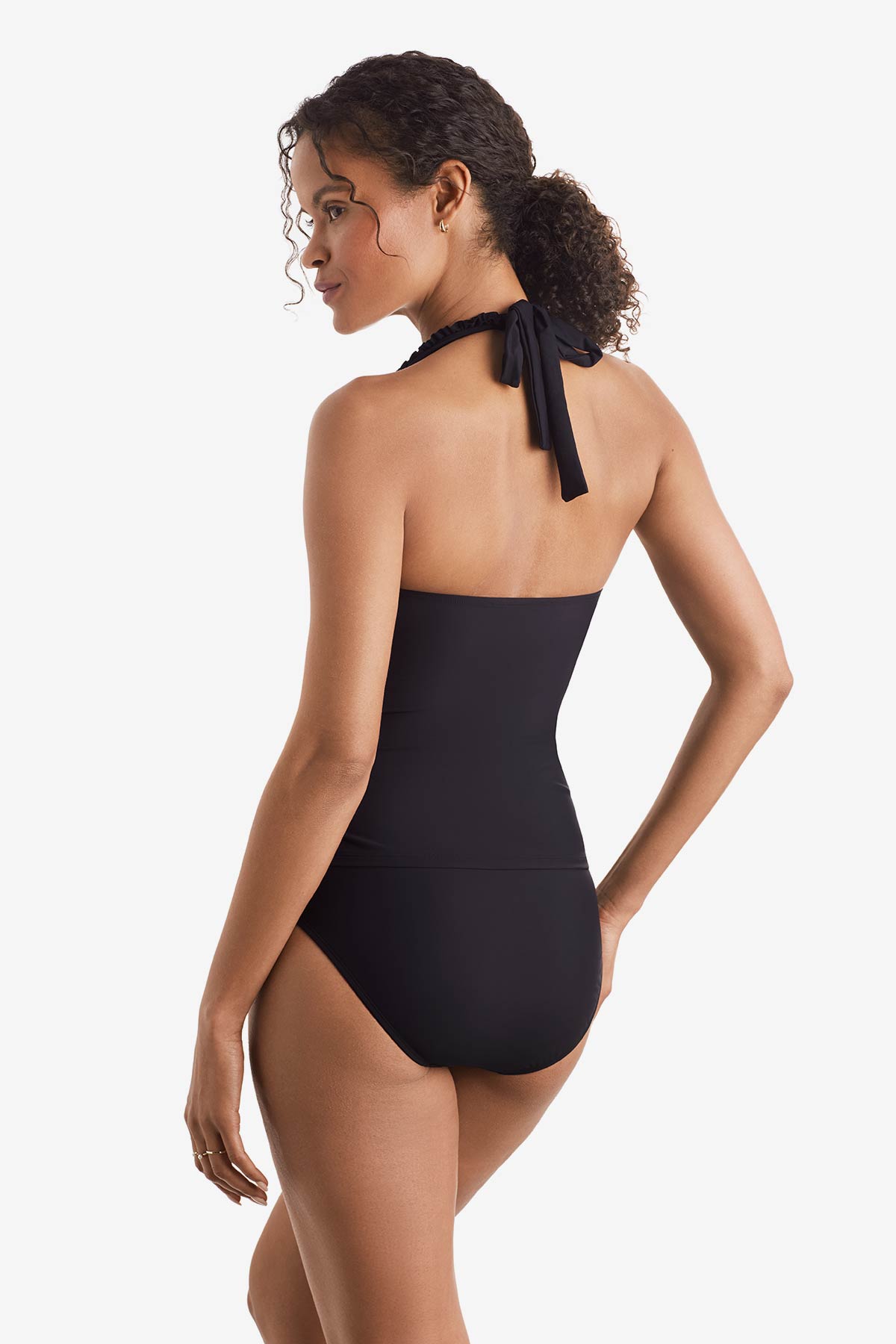 Woman turned left wearing a black tankini top