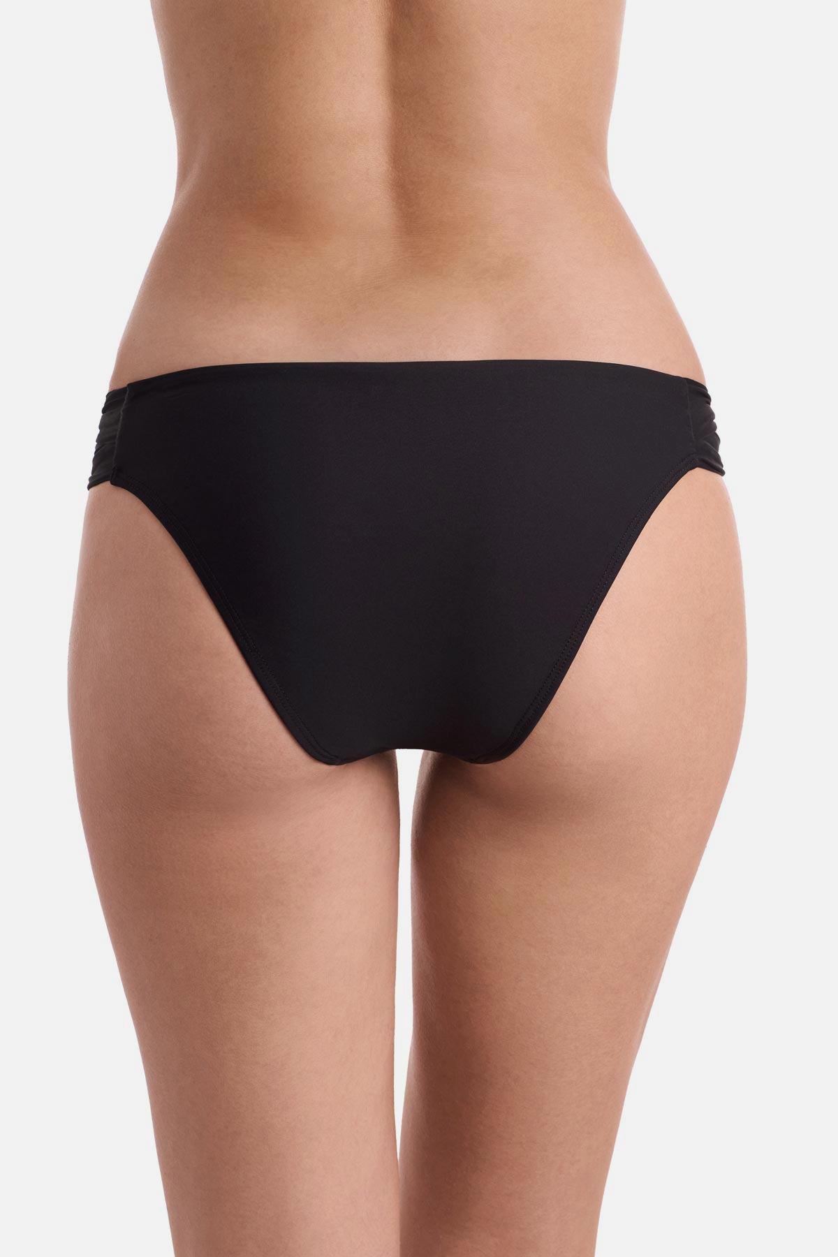 Back view of side cut out black swim bottoms